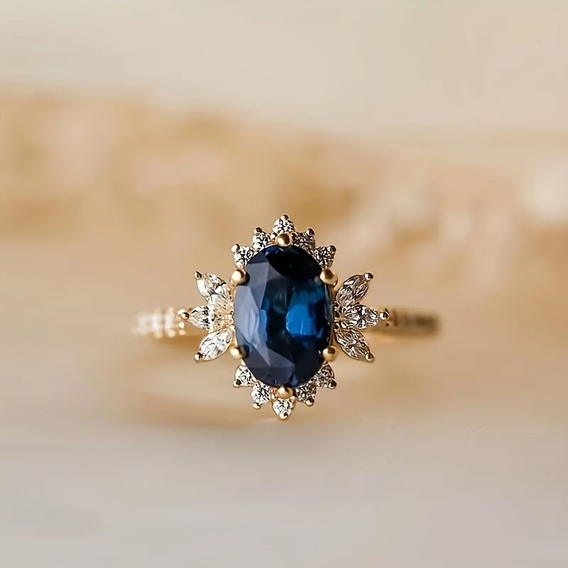 Custom Oval-Cut Sapphire Vintage Floral Halo Ring