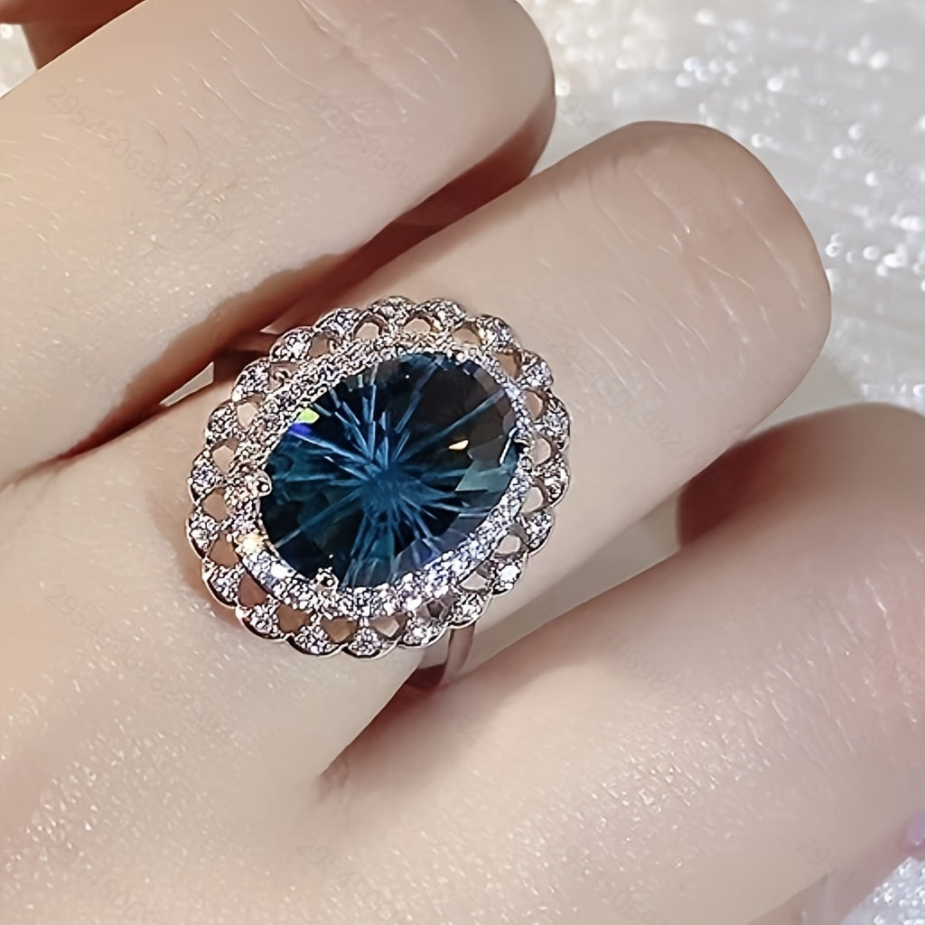 Custom Oval-Cut London Blue Topaz Vintage Halo Ring