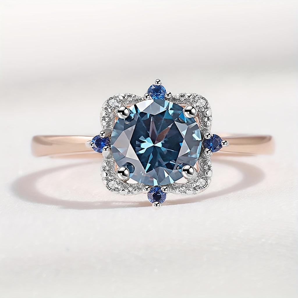 Custom Round-Cut London Blue Topaz Two-Tone Halo Ring