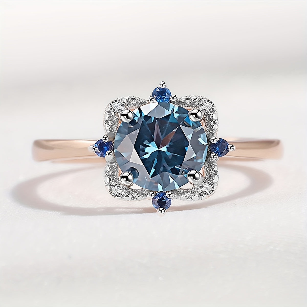 Custom Round-Cut London Blue Topaz Two-Tone Halo Ring