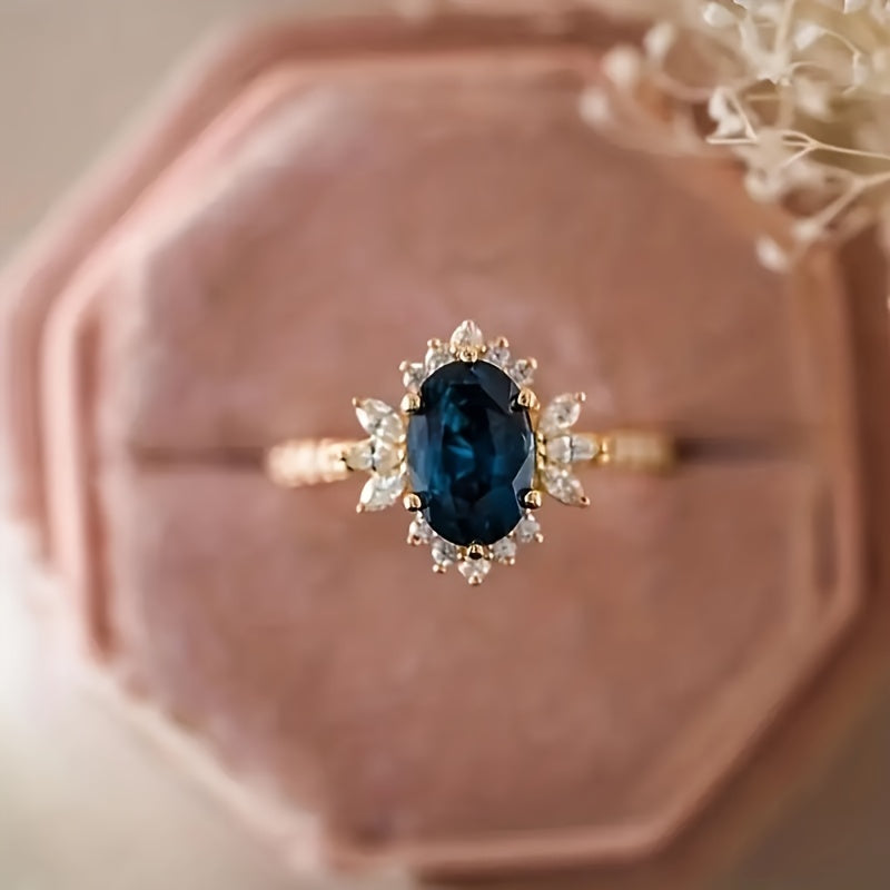 Custom Oval-Cut Sapphire Vintage Floral Halo Ring